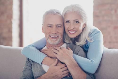 Couple with dental implants in parramatta
