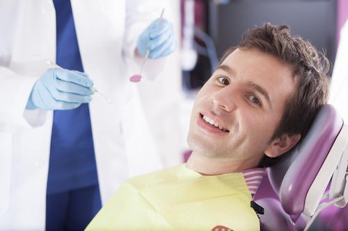 man at dentist for socket preservation in parramatta